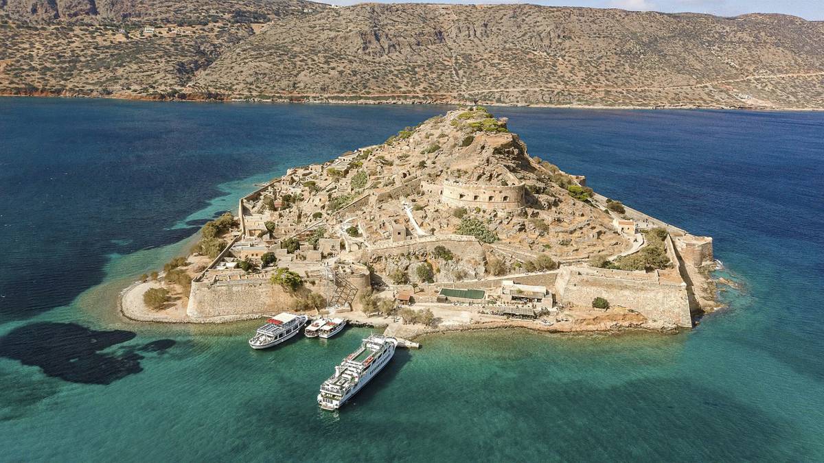 From Plaka's Pebbly Shores to Spinalonga's Historic Depths